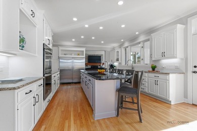 Welcome to an extraordinary all-brick estate in the prestigious - photo 9