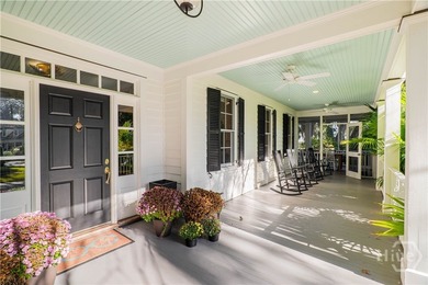 Discover refined Lowcountry living in this exquisitely updated - photo 3