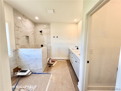 Your brand new home in Neptune's Cove is under construction with - photo 13