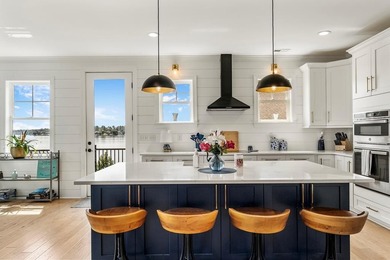 PRICE ENHANCEMENT on this Stunning Lakefront Home. Home is 2 - photo 15
