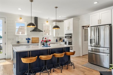 PRICE ENHANCEMENT on this Stunning Lakefront Home. Home is 2 - photo 16