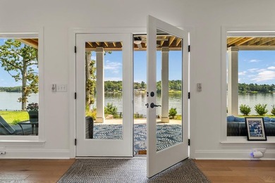 PRICE ENHANCEMENT on this Stunning Lakefront Home. Home is 2 - photo 45