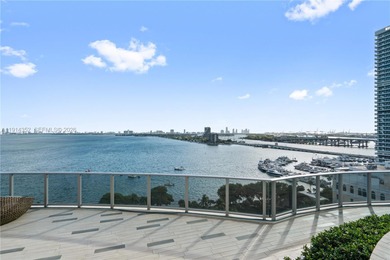 Welcome to Unit 4309 at Aria on the Bay -- a bright and spacious