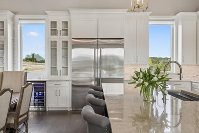 Set on 5.01 acres with a seasonal creek and natural spring, this - photo 12