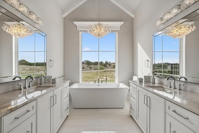 Set on 5.01 acres with a seasonal creek and natural spring, this - photo 16