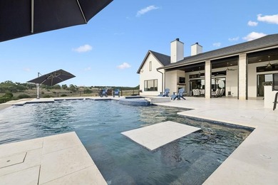 Set on 5.01 acres with a seasonal creek and natural spring, this - photo 34