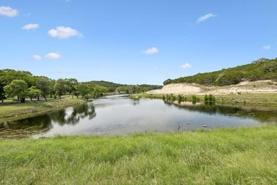 Set on 5.01 acres with a seasonal creek and natural spring, this - photo 35