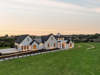 Set on 5.01 acres with a seasonal creek and natural spring, this - photo 40
