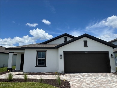 Lake Home For Sale in Lehigh Acres, Florida