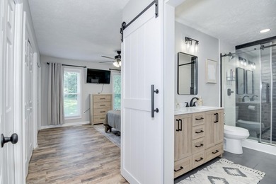 Located just 20 minutes from Evans, this updated Modoc lakehouse - photo 17