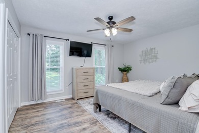 Located just 20 minutes from Evans, this updated Modoc lakehouse - photo 19