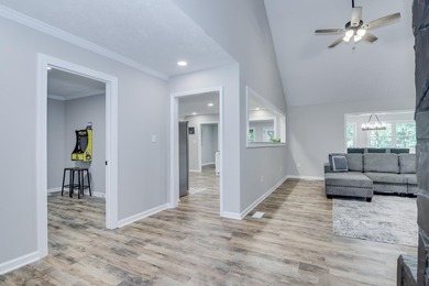 Located just 20 minutes from Evans, this updated Modoc lakehouse - photo 22