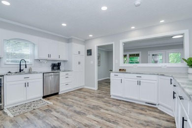 Located just 20 minutes from Evans, this updated Modoc lakehouse - photo 24