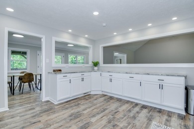 Located just 20 minutes from Evans, this updated Modoc lakehouse - photo 27