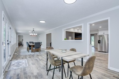 Located just 20 minutes from Evans, this updated Modoc lakehouse - photo 29