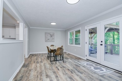 Located just 20 minutes from Evans, this updated Modoc lakehouse - photo 30