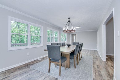 Located just 20 minutes from Evans, this updated Modoc lakehouse - photo 31