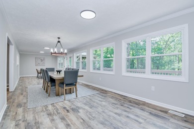 Located just 20 minutes from Evans, this updated Modoc lakehouse - photo 32