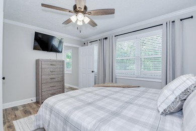 Located just 20 minutes from Evans, this updated Modoc lakehouse - photo 35