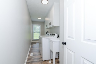 Located just 20 minutes from Evans, this updated Modoc lakehouse - photo 39