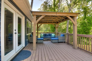 Located just 20 minutes from Evans, this updated Modoc lakehouse - photo 48