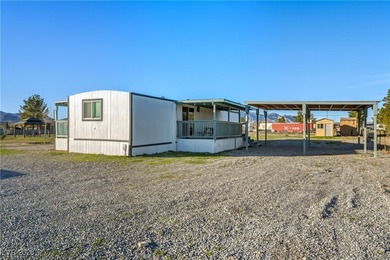 Affordable living just outside of Las Vegas! This 2 bedroom, 1