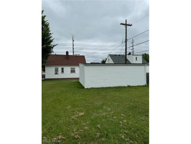 730 Babbitt Road in Euclid offers a classic layout with a - photo 21