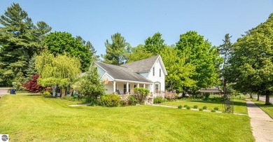 Antrim County Chain of Lakes Home Active Under Contract in Bellaire Michigan