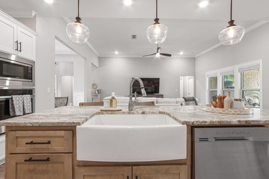 Embrace coastal charm at 810 Brushed Dune Circle, in the Gated - photo 13