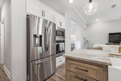 Embrace coastal charm at 810 Brushed Dune Circle, in the Gated - photo 14