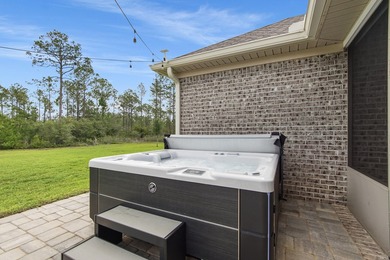 Embrace coastal charm at 810 Brushed Dune Circle, in the Gated - photo 48