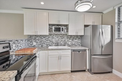 Beautifully renovated 2-bedroom, 2-bathroom first-floor condo in - photo 3