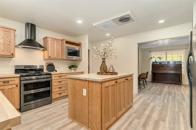 Nestled on a scenic half-acre riverfront lot in Pecan Plantation - photo 12