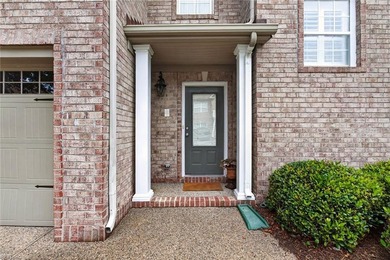 Welcome to this stunning all-brick end-unit condo, tucked away - photo 2