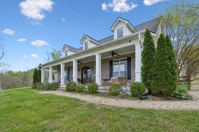 Set at the end of a private drive, this custom-built home sits - photo 2