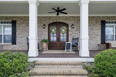 Set at the end of a private drive, this custom-built home sits - photo 3