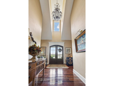 Set at the end of a private drive, this custom-built home sits - photo 5