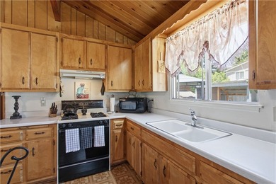 Charming Mountain Retreat with Rustic Character! This inviting - photo 10