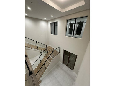 NO EXPENSE OR DETAIL SPARED IN OUR LARGEST ESTATE HOME IN CORAL - photo 5