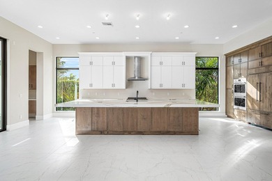 NO EXPENSE OR DETAIL SPARED IN OUR LARGEST ESTATE HOME IN CORAL - photo 10