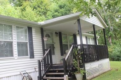 Charming 3-bedroom, 2-bath manufactured home setting on 1.06 - photo 3