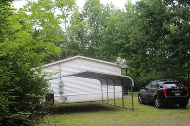 Charming 3-bedroom, 2-bath manufactured home setting on 1.06 - photo 5