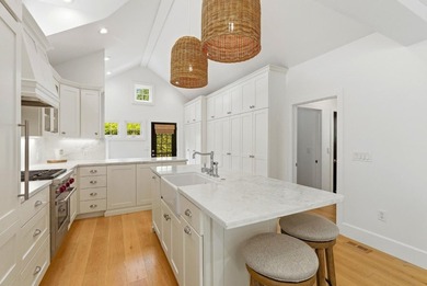 Experience refined coastal living in this fully remodeled beach - photo 4