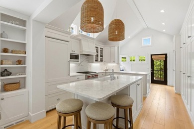 Experience refined coastal living in this fully remodeled beach - photo 8
