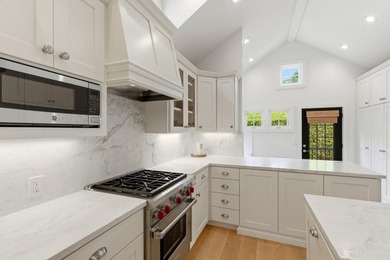 Experience refined coastal living in this fully remodeled beach - photo 9