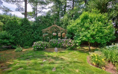 Nestled on a picturesque and private, flat .56-acre property - photo 40