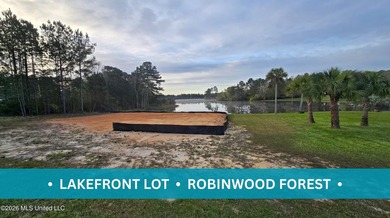Escape the city and build your dream retreat on this rare 0.76 - photo 1