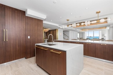 Indulge in the pinnacle of coastal luxury with this