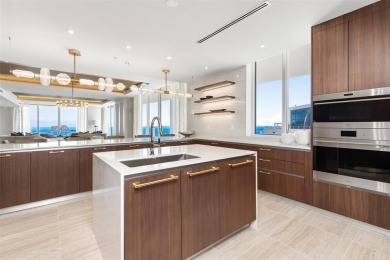 Indulge in the pinnacle of coastal luxury with this