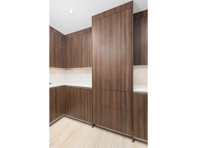 Indulge in the pinnacle of coastal luxury with this